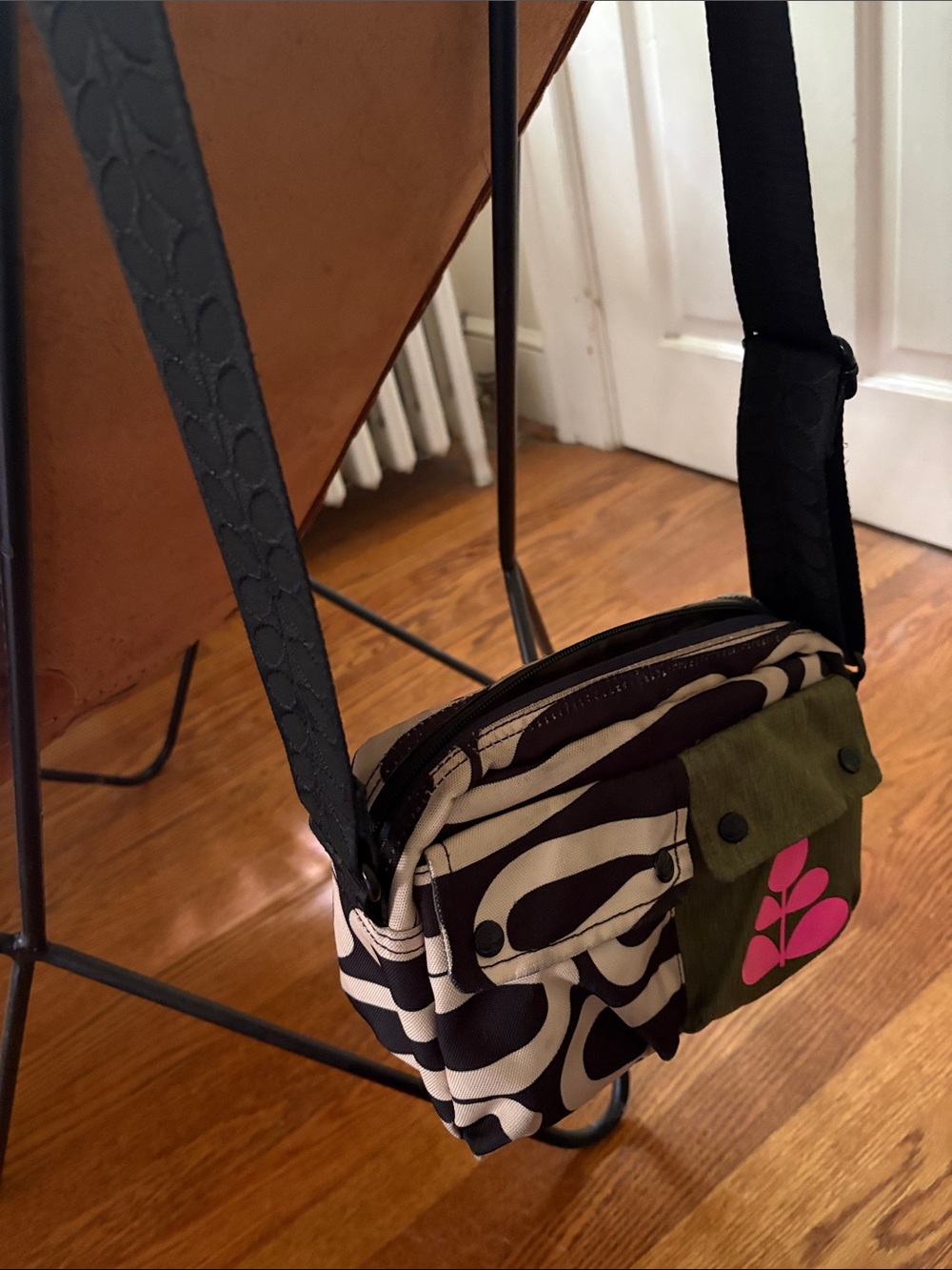 Orla Kiely Angle Camera Crossbody Bag in Black, White, Olive and Pink.